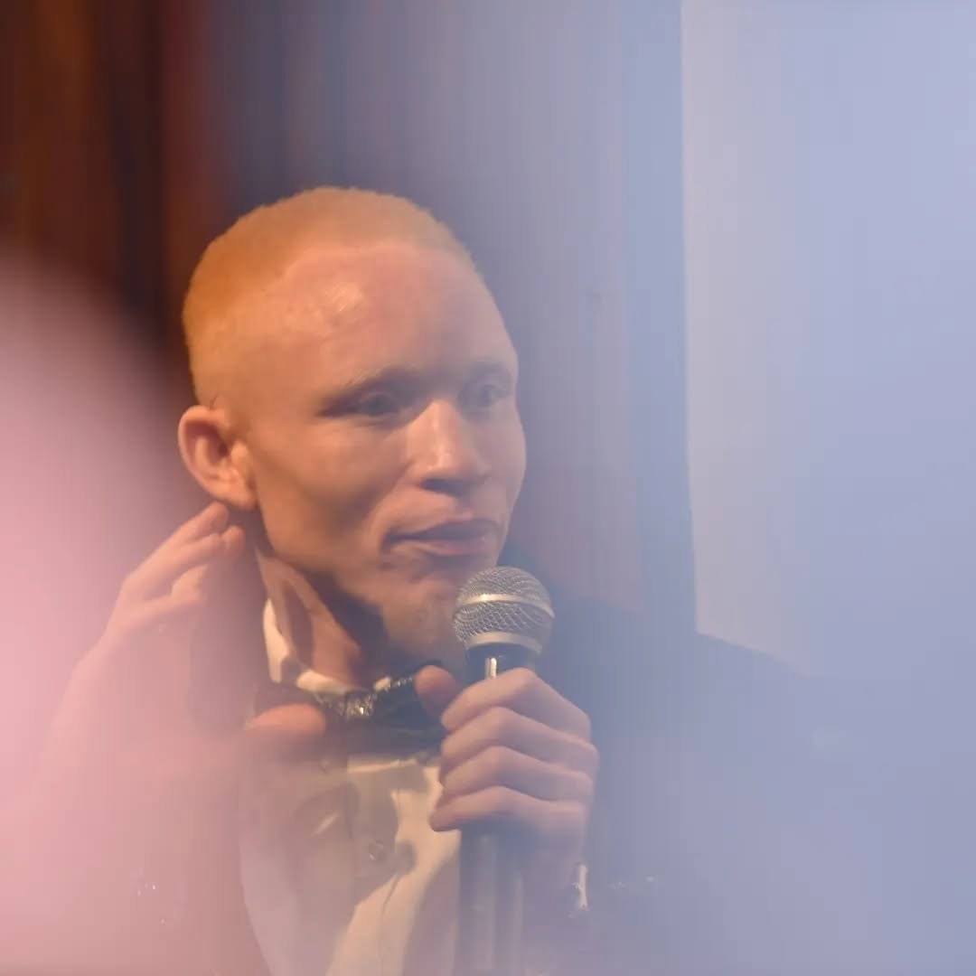 Jairus Ong'eta, who performs as Jay PoeTree, photographed at an event.